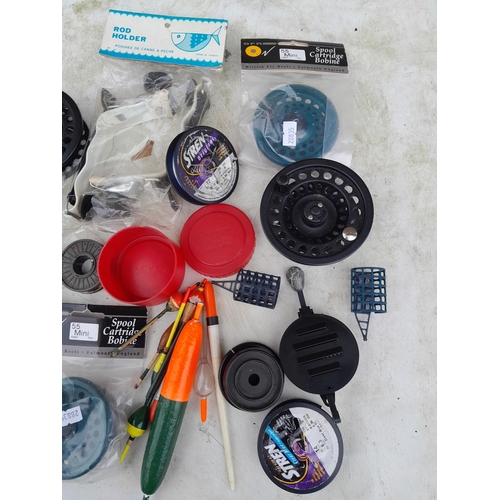 146 - Fishing interest : fly fishing reel cartridges, floats some new old stock