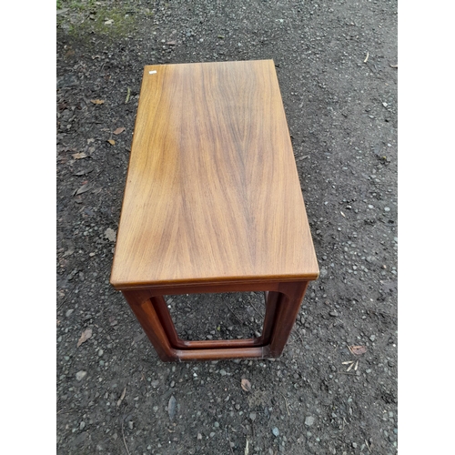 284 - Nest of mid 20th century design teak tables, colour fade to larger table 76 cms x 40 cms x 65 cms