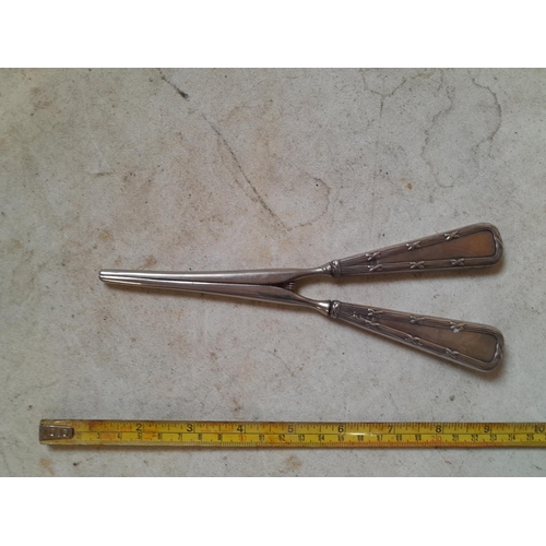 454 - Silver handle glove stretchers