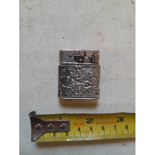 660 - Baby Myflam with foreign hallmarked silver jacket, depicting tavern scene on front and floral motifs... 