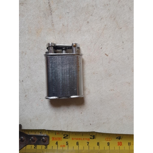 663 - The Golden Wheel USA lift arm lighter from the 1930s, working order