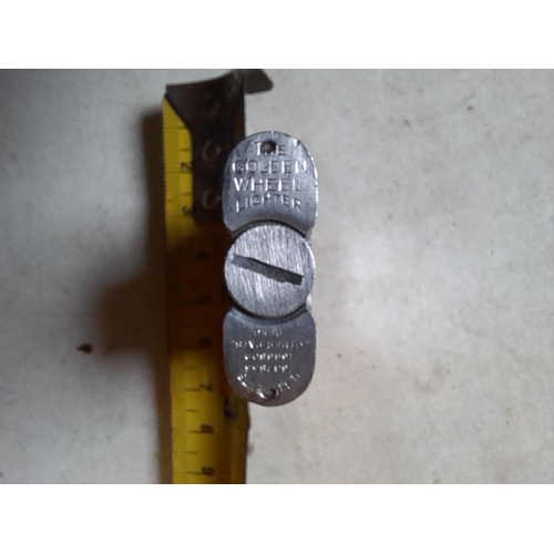 663 - The Golden Wheel USA lift arm lighter from the 1930s, working order