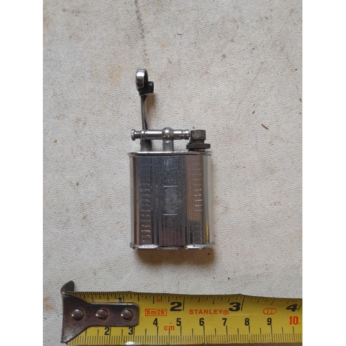 663 - The Golden Wheel USA lift arm lighter from the 1930s, working order