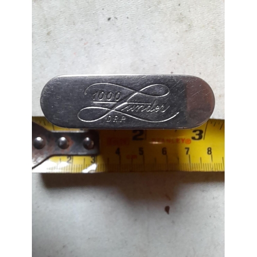 665 - Rare Zunder 1000 trigger lighter, lift arm mechanism from the 1930s with enamelled decoration of coa... 