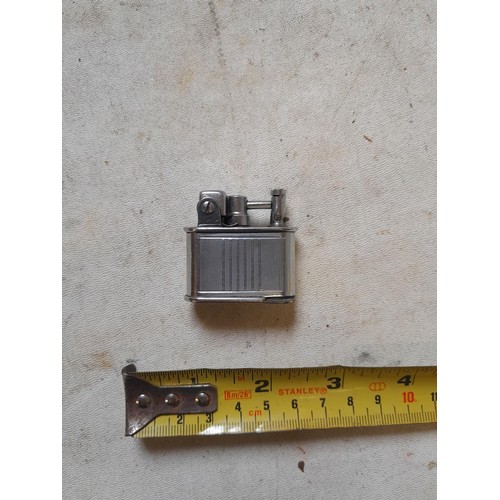 667 - Lancel pocket lighter, lift arm action, French from the 1930's