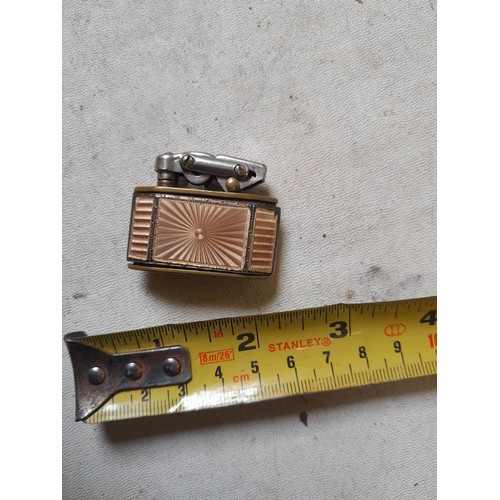 668 - KW Wieden  guilloche enamel with silver inset border, ladies handbag / pocket lighter KW on base fro... 