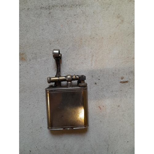671 - Dunhill Unique silver plated lighter with lift arm action pat 143752 from the late 1920s with double... 
