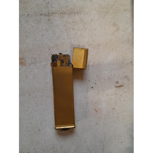 673 - Dunhill gold plated lighter retailed through Asprey & Co. Ltd New Bond Street, from the 1930s engine... 