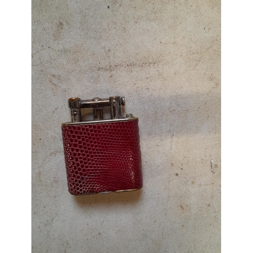 674 - Dunhill Unique lighter from the mid 1920s with red lizard skin decoration and lift arm action Pat 14... 