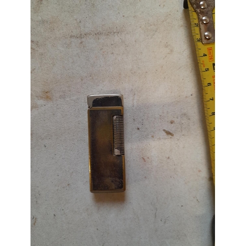 676 - Dunhill silver plated Rollalite gas lighter US Pat 16757352