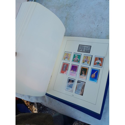 57 - 14 albums and stocks of post war Stamps of Germany, some mounted mint and used  and some loose in ti... 