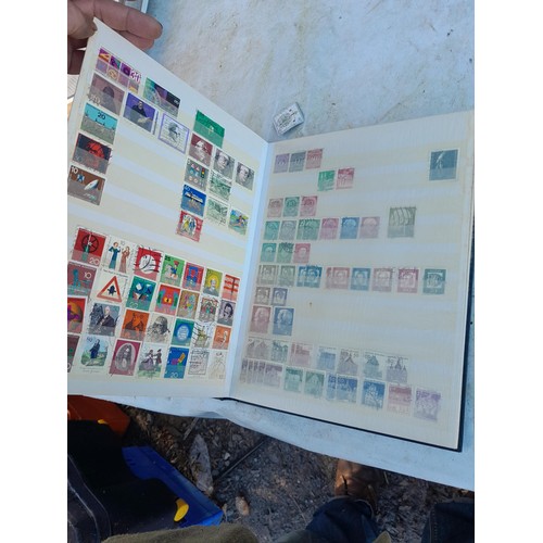 57 - 14 albums and stocks of post war Stamps of Germany, some mounted mint and used  and some loose in ti... 