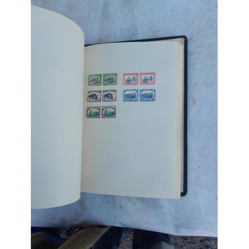 75 - Random array of GB, Commonwealth and stamps of the world, mint and used in 8 albums