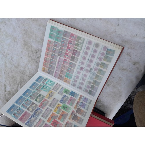 79 - Large array of GB, Commonwealth and World stamps from all eras  mounted minted and used in 18 stock ... 