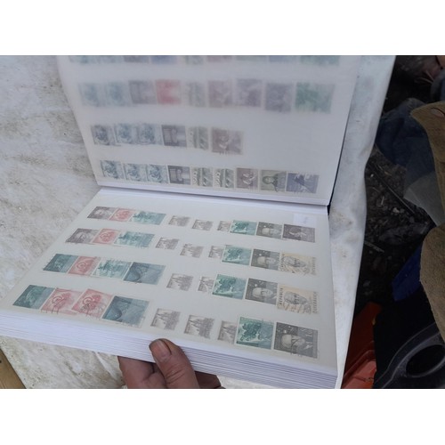 79 - Large array of GB, Commonwealth and World stamps from all eras  mounted minted and used in 18 stock ... 