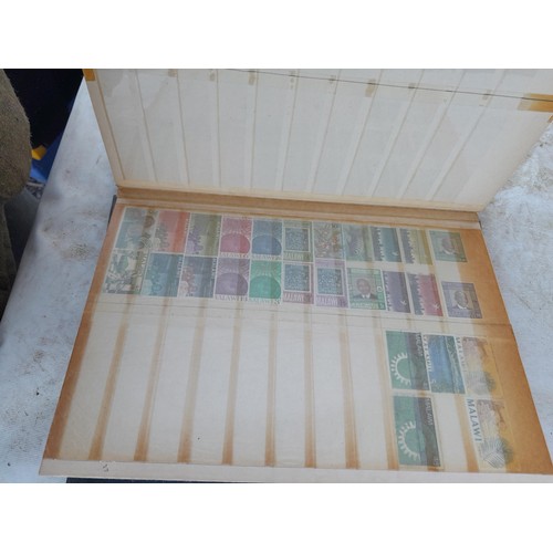 79 - Large array of GB, Commonwealth and World stamps from all eras  mounted minted and used in 18 stock ... 