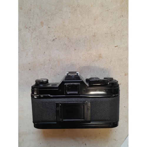 56 - Canon AE -1 camera body