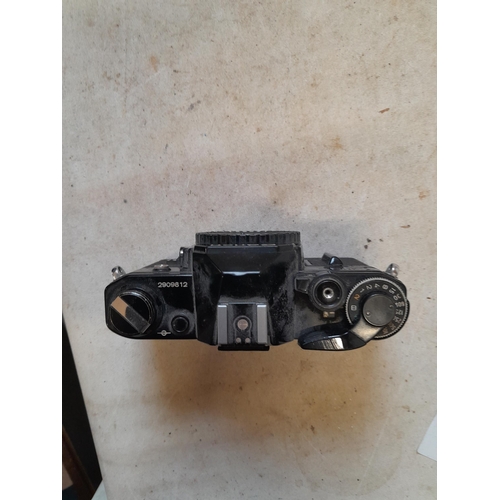 56 - Canon AE -1 camera body