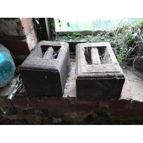 122 - Pair of iron weights, suitable for market stalls
