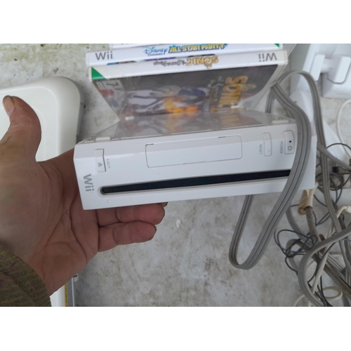 143 - Nintendo Wii console with games and other accessories