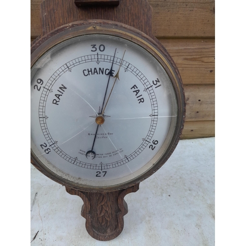173 - Vintage carved oak barometer