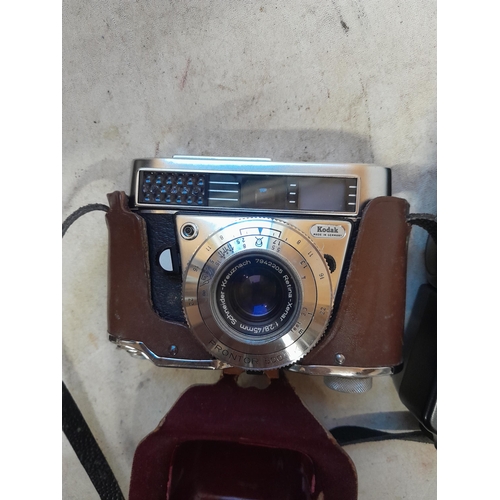 186 - Vintage Kodak Retina IF in leather case & Canon flash unit