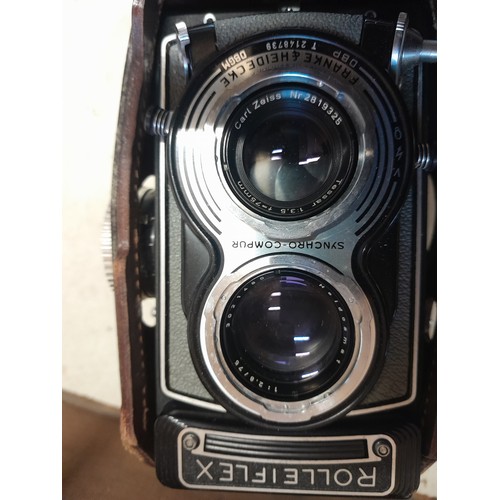 191 - Vintage Rolleiflex with Carl Zeiss Tessar twin lens camera in leather case of issue