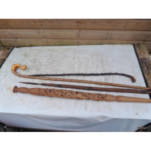 2 - Collection of various walking sticks, African spear, ceremonial stick etc.