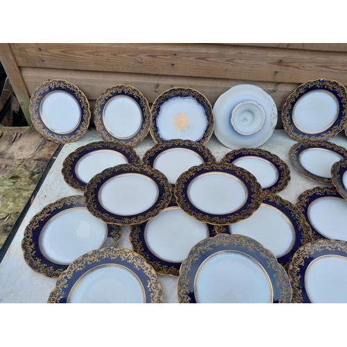 16 - Limoges blue and gilt dinner ware