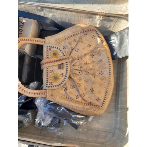 11 - Suitcase of non branded hand bags and purses some new old stock