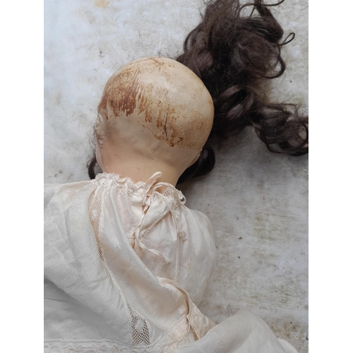 21 - Damaged composite doll and film and other posters