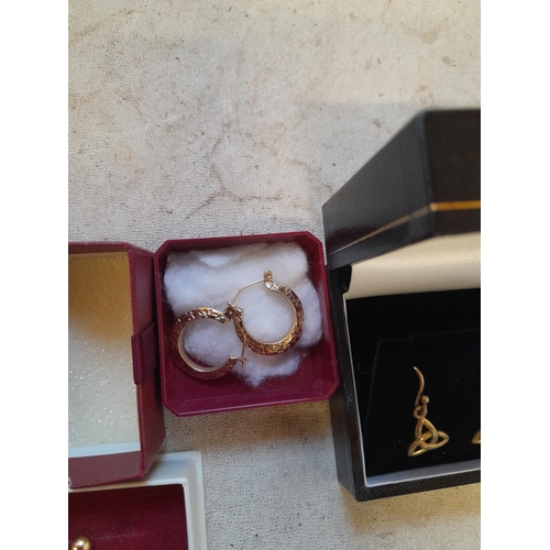 154 - Assorted 9 ct gold earrings in presentation boxes