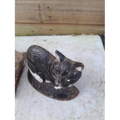 173 - Vintage painted spelter Westie dog on plinth an cast iron cat door stop