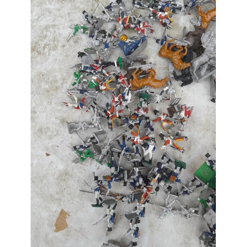 241 - Painted and bare vintage lead and mixed metal toy soldiers and horses