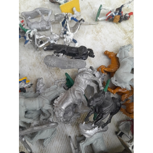 241 - Painted and bare vintage lead and mixed metal toy soldiers and horses