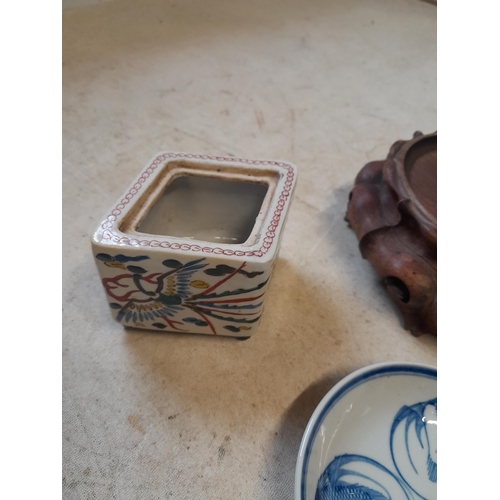 68 - 19th century carved Chinese hardwood vase stand, 19th century blue and white dish and vase