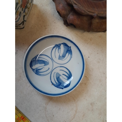 68 - 19th century carved Chinese hardwood vase stand, 19th century blue and white dish and vase