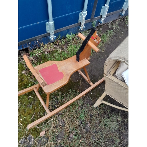 117 - Vintage K & W childs composite doll, small wooden rocking horse and dolls basket weave crib