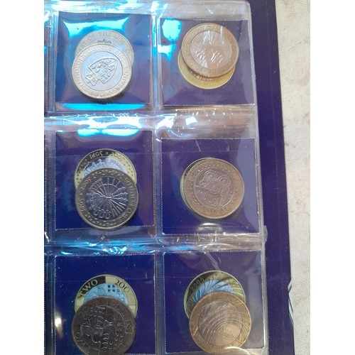 217 - Coins : 32 x £ 2 coins mainly collectable reverse head, & 54 x  50 pence coins with collectable reve... 