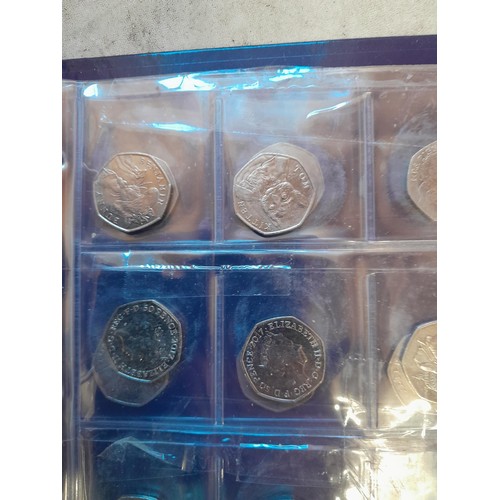 217 - Coins : 32 x £ 2 coins mainly collectable reverse head, & 54 x  50 pence coins with collectable reve... 