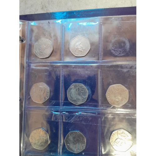 217 - Coins : 32 x £ 2 coins mainly collectable reverse head, & 54 x  50 pence coins with collectable reve... 