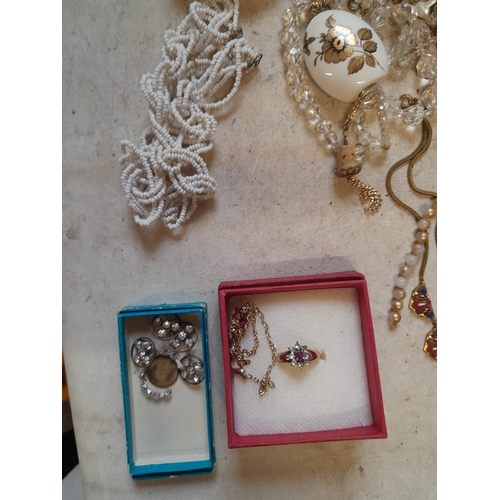 252 - Costume jewellery, silver buttons etc.