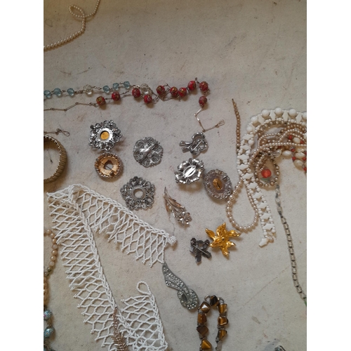 252 - Costume jewellery, silver buttons etc.