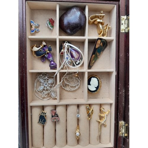 299 - Casket of costume jewellery, small amount of silver included