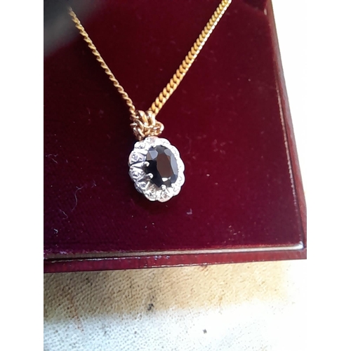 301 - 9 ct gold sapphire pendant 1.5 g on a gold plated necklace in presentation case