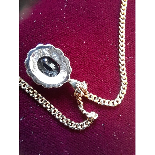 301 - 9 ct gold sapphire pendant 1.5 g on a gold plated necklace in presentation case