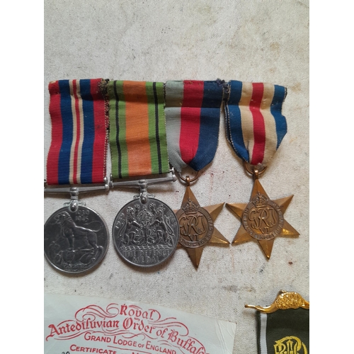 302 - Collection of unnamed Word War II medals possibly pertaining to  Peter Young or relatives along with... 