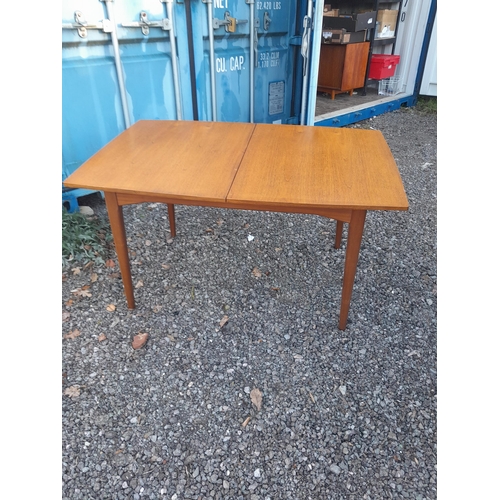 486 - Mid 20th century designer G Plan teak dining table with extra leaf (Ernest Gomme interest)