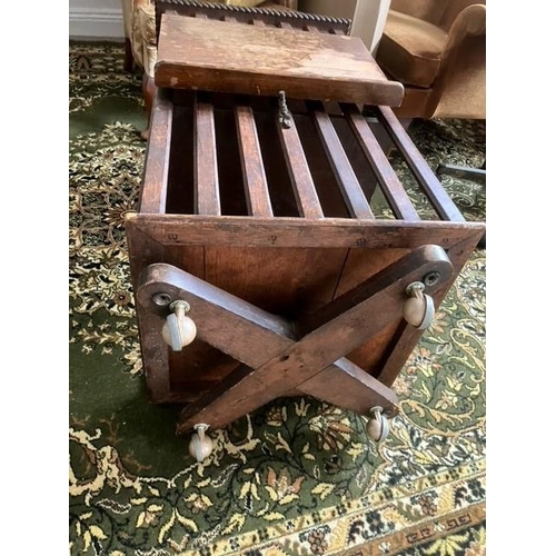 673 - Early 20th century oak revolving bookcase on later ball castors with fold down tray Dimensions 52cm ... 