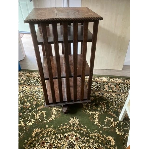 673 - Early 20th century oak revolving bookcase on later ball castors with fold down tray Dimensions 52cm ... 